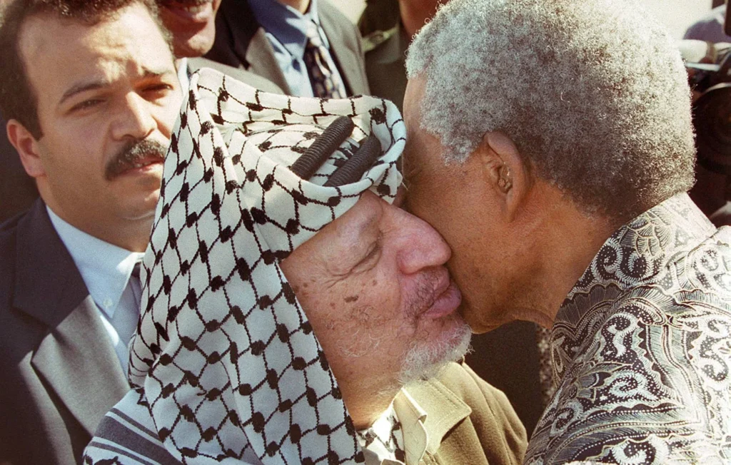 palestine rafah plo yasser arafat south africa president nelson mandela october 1999 afp.jpg