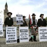 A group of Orthodox Jews protest against Zionism and draw attention to the Palestinian struggle in T..
