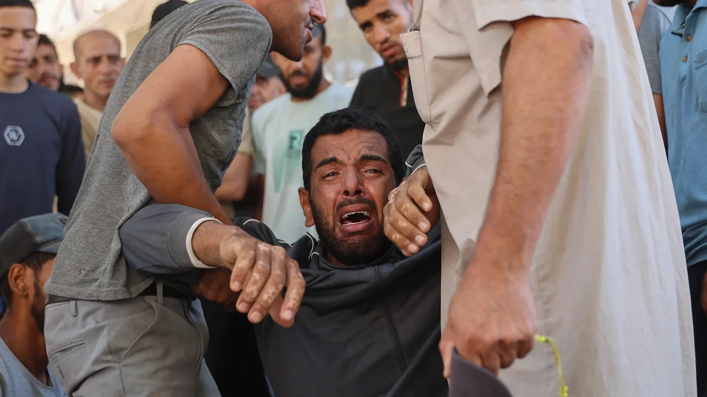 Palestinian-cries-shifa-hospital-gaza-July-AFP.jpg