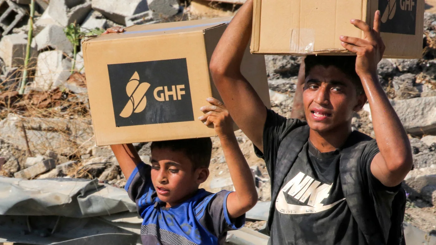 ghf aid gaza boys boxes afp.jpg