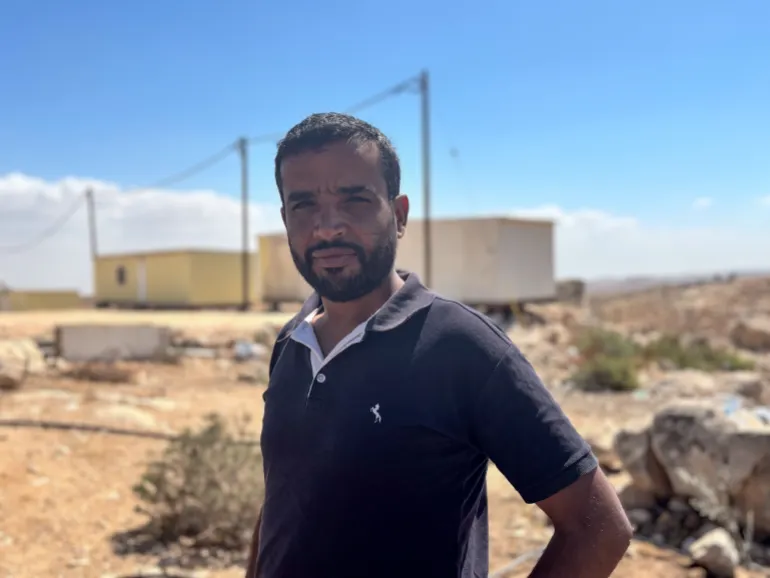 Khalil Al Hathaleen in front of caravans 2 1759226738