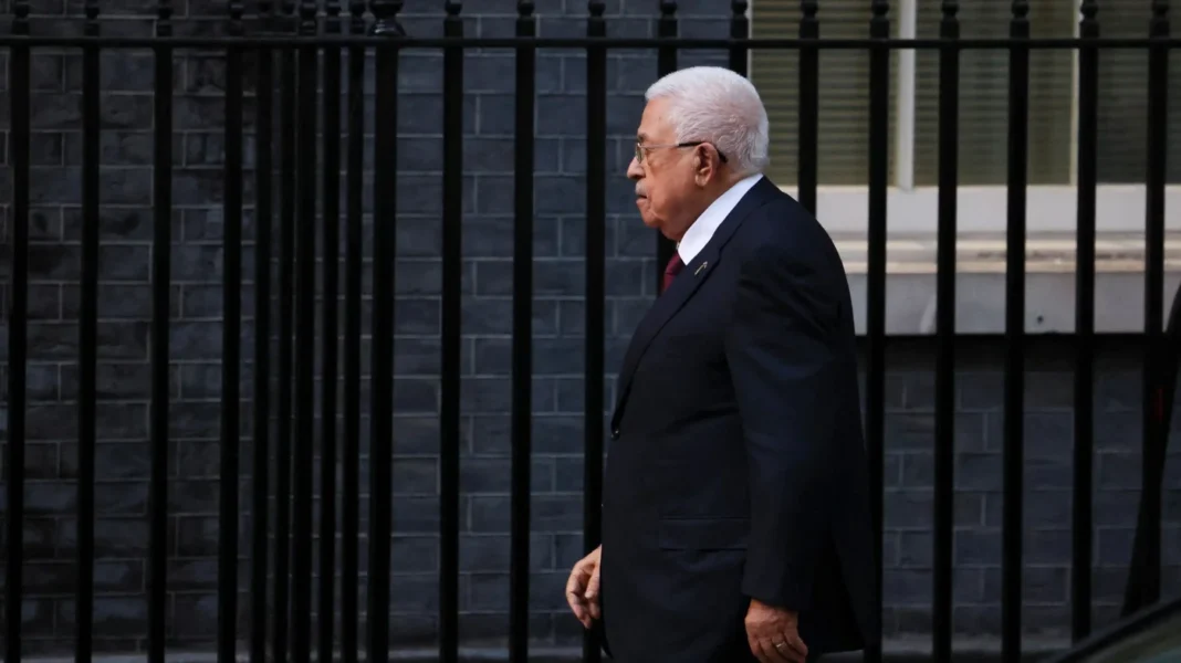 Palestinian President Mahmoud Abbas walks on Downing Street to meet British Prime Minister Keir Starmer, in London, Britain, September 8, 2025. REUTERS.jpg