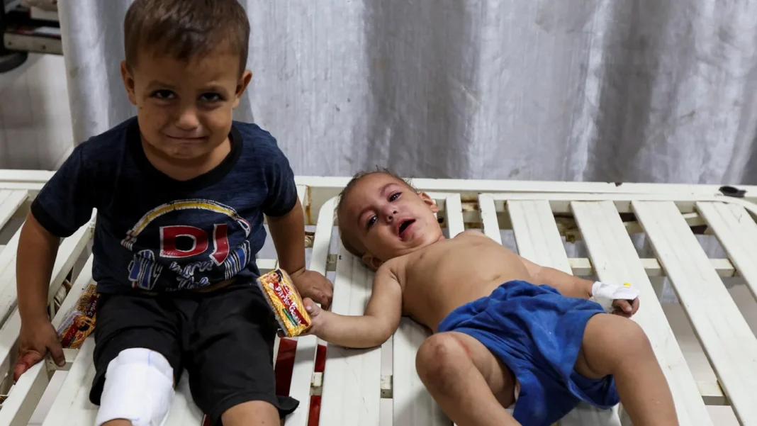 Palestinian children receive treatment after being injured in an Israeli strike, at Nasser Hospital in Khan Younis reuters 19 octber.jpg