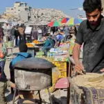 gaza-market-seller-27-feb-2025-afp.jpg