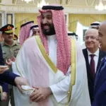 Turkish President Tayyip Erdogan, Saudi Crown Prince Mohammed bin Salman and Pakistan's Prime Minister Shehbaz Sharif chat after signing a joint defense agreement in Mecca, Saudi Arabia,