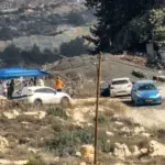 Photo-of-settlers-posted-outside-Abayat-home-Umm-Safa-1792581885